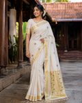Elegant Kerala Tissue Saree with Green & Golden Floral Embroidery
