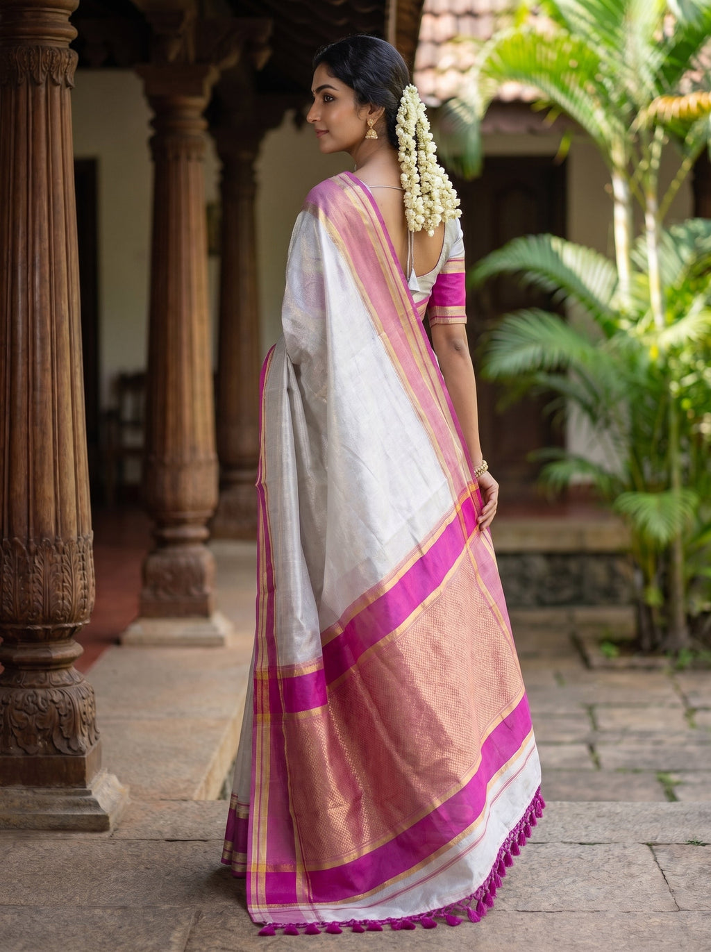 Elegant Kerala Tissue Saree with Pink Border