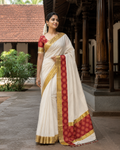 Elegant Tissue Saree with Golden Stripes