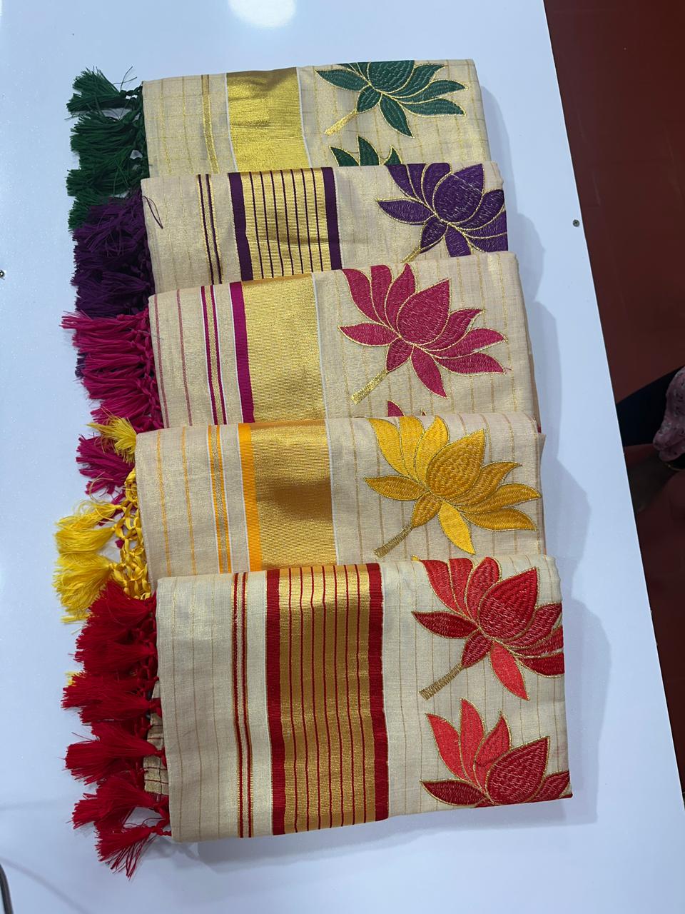 Elegant Tissue Tissue Saree with Green Floral Thread Work & Running Blouse